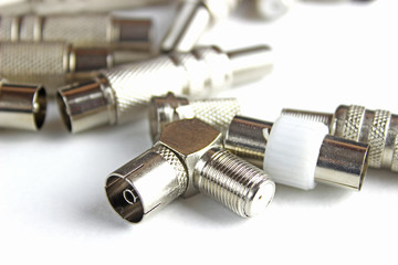 Metal adapter for internet networks isolated on white background.