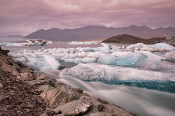 Jokulsarlon glacier lagoon in Iceland. Long exposure shot makes the water and the sky silky. Long exposure, glacier, moody concepts