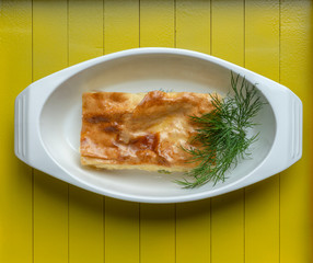  Georgian dish of dough in layers and feta cheese is Achma