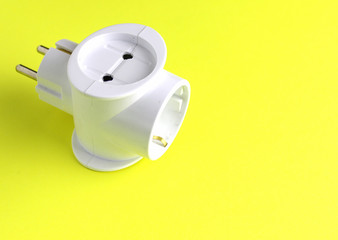 European power strip. Euro 3-way multi-plug, isolated on white background with shadow reflection. With clipping path. With  path. Continental adaptor on white bg.