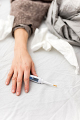 Obraz na płótnie Canvas Woman sick in the bed, flu and virus infections, allergy, seasonal healt issues.