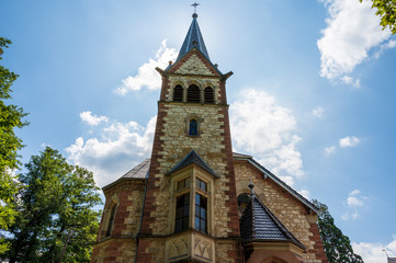 Fototapeta na wymiar View of the tower of the Martin-Luther-Church in Staufen im Breisgau