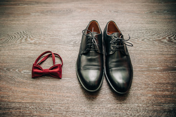 Black classic shoes and bow tie