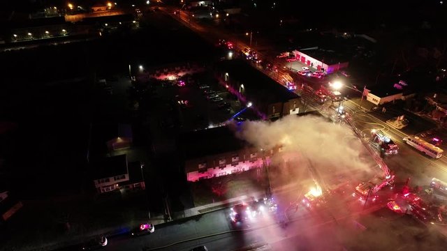 Aerial View of Fire Trucks and Apparatus on Scene of Structure Fire