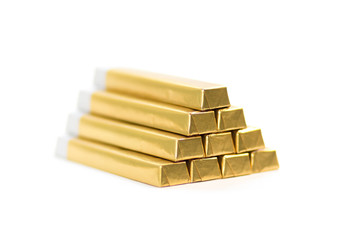 Chocolate bars in the shape of gold bars. Close up. Isolated on a white background