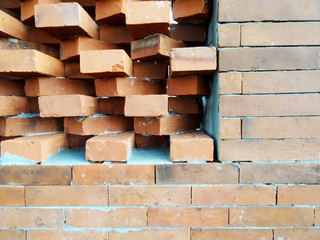 Obraz premium Wall made of red brick wall with unique composition