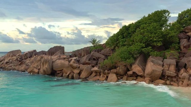 Landscape Seychelles Island Mahe in Indian ocean, beautiful blue sea with waves, sand beaches and green forest in the tropical paradise. Travel pictures. Holiday scenery with the beach, sea, waves