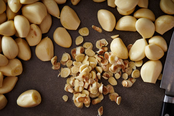 Peeled garlic background, studio shot 