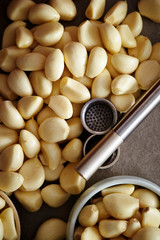 Peeled garlic background, studio shot 