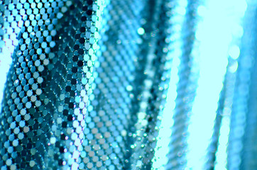 abstract luminous blurred blue background, metal mosaic