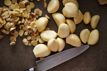 Peeled garlic background, studio shot 