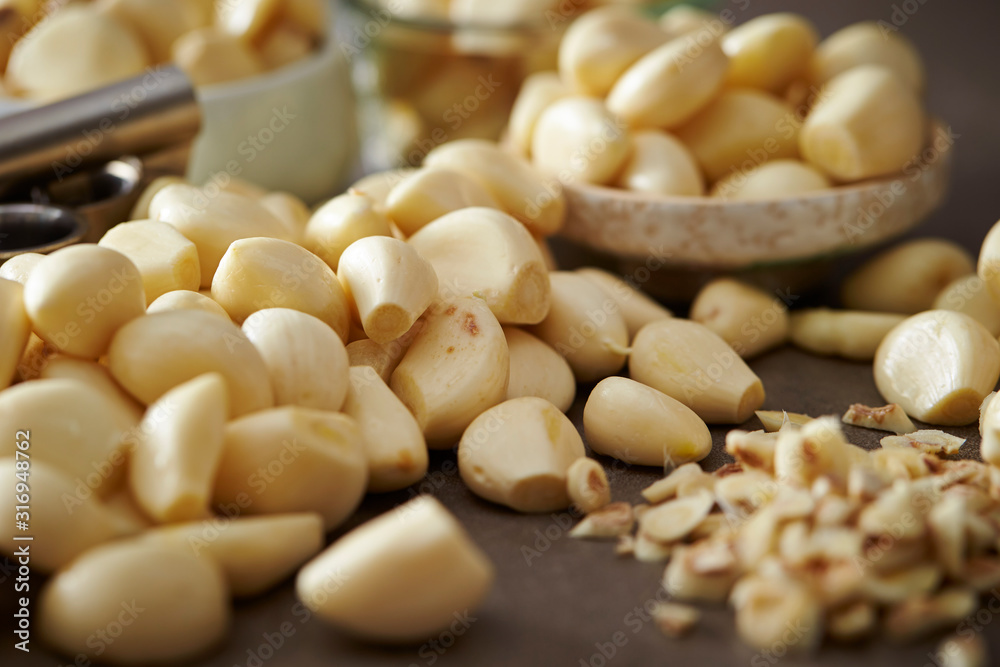 Canvas Prints peeled garlic background, studio shot