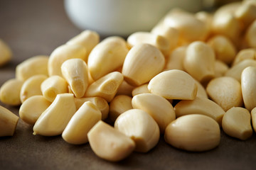 Peeled garlic background, studio shot 