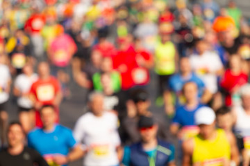 Crowd of runners run a marathon