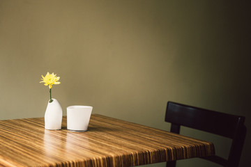 Table and chair and flower