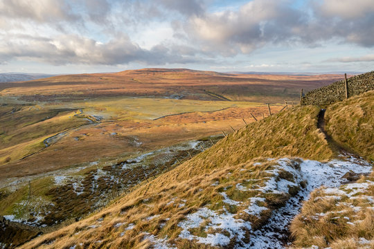 Great Whernside From Kettlewell On A Cold Winters Blue Sky Day With Some Snow And Frost On The Ground