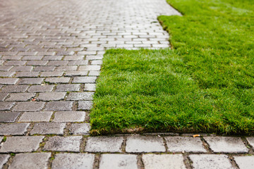 Turf on a cobblestone street