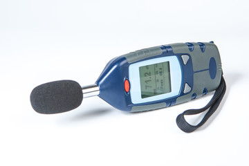 Sound level meter on a white background. Apparatus for measuring noise level in the room. Equipment for measuring sound level. Noise meter on a white background. Equipment for construction and repair