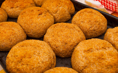closeup of baked buns in a pan