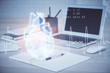 Desktop computer background and heart drawing. Double exposure. Medical study and healthcare concept.