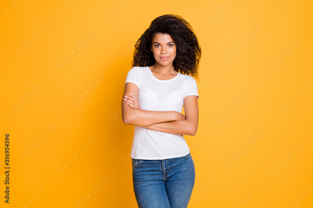 Sticker Photo of dreaming intelligent clever girlfriend in jeans denim white t-shirt with arms crossed posing isolated vivid color background