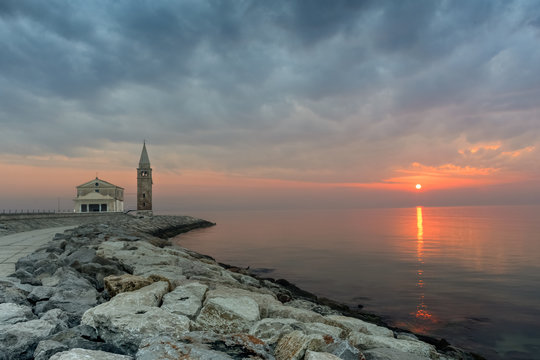 Seascape of Caorle, in the background the Santuario della Madonna dell'Angelo in background, venetian lagoon, Veneto, Italy, Europe