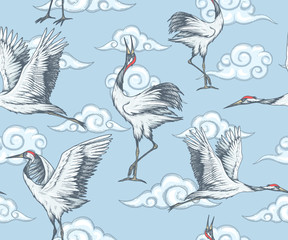 Seamless pattern with cranes and clouds in japanese style