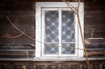 Old window wooden house