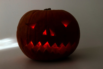 halloween orange pumpkin with evil smile