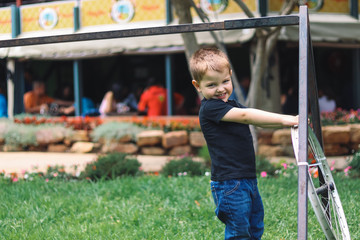 Little Boy playing in the park