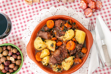 rustic meal of ox tail with potato and carrot