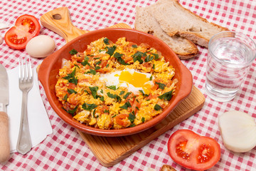 Traditional homemade meal of tomato with egg