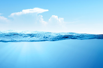 A wave of blue water on the ocean