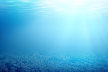 Underwater view of blue water and sunlight