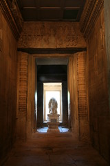Fototapeta na wymiar The idol statue inside the main Phimai stone castle.