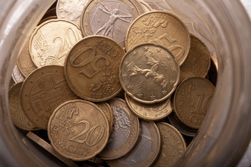 Euro coins in jar