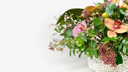 Beautiful flower arrangement with mixed flowers. Floral theme.