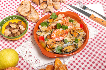 Traditional homemade meal of rice and seafood.