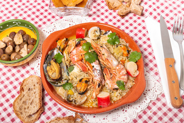 Traditional homemade meal of rice and seafood.