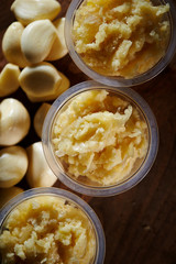 Crushed garlic in plastic bowl 