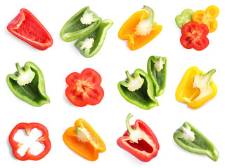 Set of different cut ripe bell peppers on white background, top view