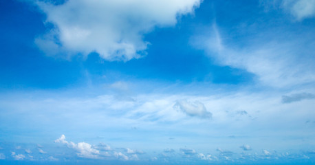 Naklejka na ściany i meble Blue sky background with tiny clouds. clouds in the blue sky