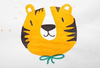 Child's painting of tiger on white paper