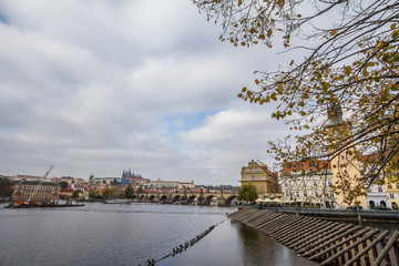 Panorama of the Old Town of Prague, Czech Republic, with a focus on Charles bridge (Karluv Most)  and the Prague Castle (Prazsky hrad) seen from the Vltava river. 