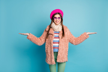 Portrait of her she nice-looking attractive pretty lovely fashionable cheerful cheery girl holding on palms copy space isolated on bright vivid shine vibrant green blue turquoise color background