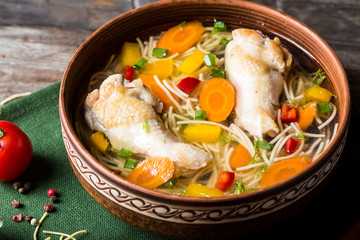 chicken soup with vegetables. Healthy food. Traditional dish. Carrot dish. Pasta soup. minestrone soup