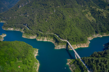 Aerial view, automobile bridge, Lake Valvestino, Italy.