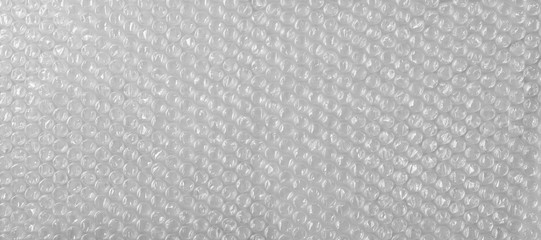 Bubble wrap protective packaging on white background and texture - obrazy, fototapety, plakaty
