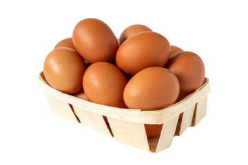 Brown chicken eggs in a wooden basket