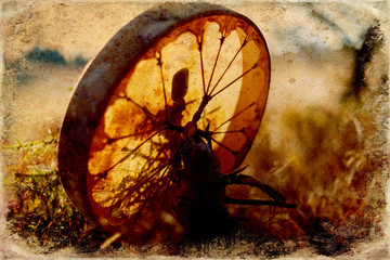 shamanic drum in nature, shamanic drum with crystal, old effect and border.